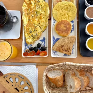 Moroccan typical breakfast, baghrir, omlette, amlou